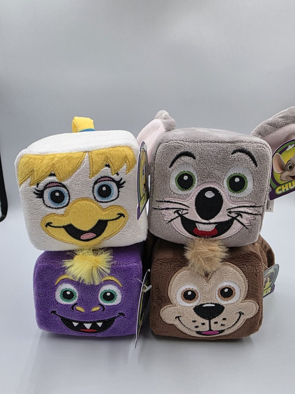 Lot Of 4 Brand New 2023 Chuck E Cheese’s Square Stackable Collectible Plush Set
